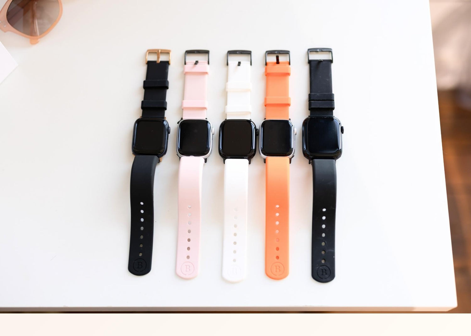Five BURŪV bands on white table