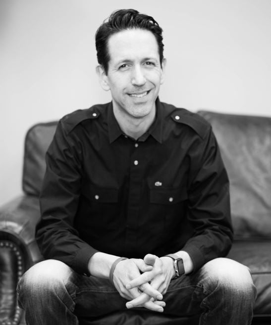 BURŪV band founder Dr. Brian Matthys in black and white photo