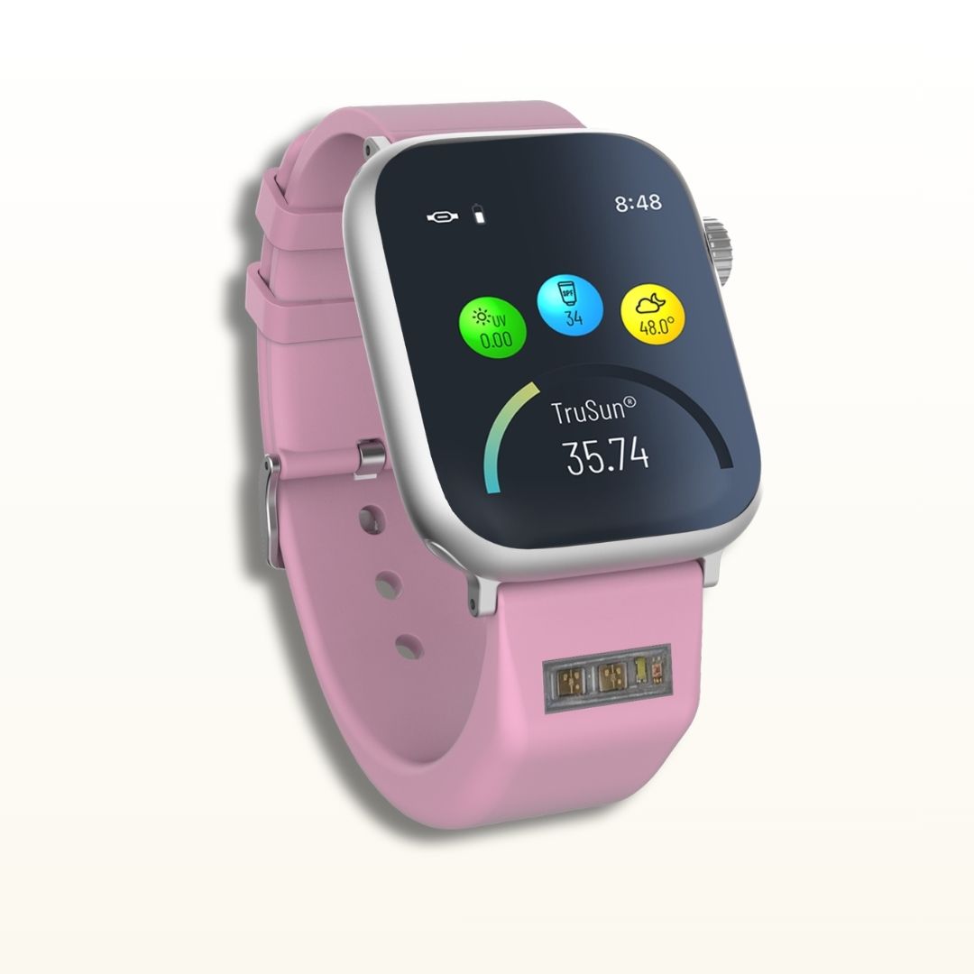 The Pink BURŪV smart band with Apple Watch® displaying TruSun® settings on a clean off-white background.